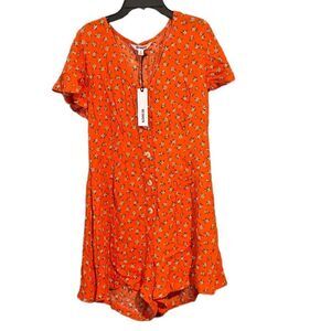 BB Dakota Women’s Floral Romper in Size Small. Orange in color. NEW